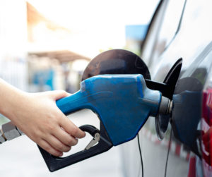 putting gasoline on car