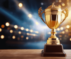 Golden trophy cup on wooden base