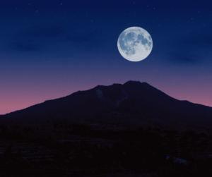 full moon on a pinkish sky background