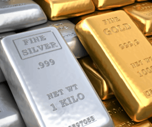 highly polished bars of precious metals, specifically a silver bar and multiple gold bars