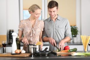 couple cooking together in a modern kitchen