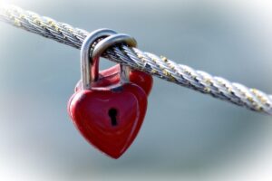a red, heart-shaped padlock