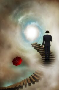 man ascending stairs to heaven