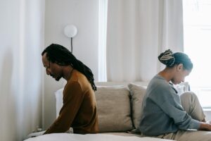 couple with their backs on each other
