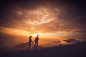 couple on top of mountain