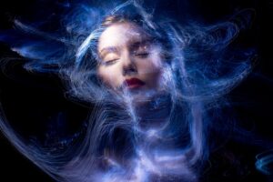 woman with closed eyes and hazy aura