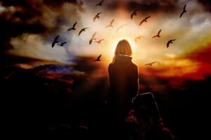 woman sunset cliff travel